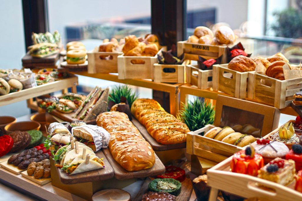 An enticing assortment of pastries and baked goods on display, showcasing a variety of textures and flavors.